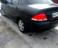 Чорний Міцубісі Lancer, об'ємом двигуна 1.6 л та пробігом 211 тис. км за 3500 $, фото 1 на Automoto.ua