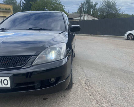 Чорний Міцубісі Lancer, об'ємом двигуна 2 л та пробігом 183 тис. км за 4500 $, фото 16 на Automoto.ua