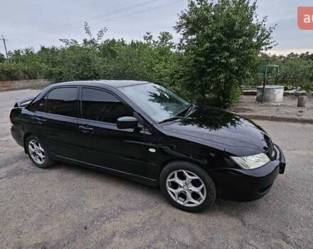 Чорний Міцубісі Lancer, об'ємом двигуна 1.6 л та пробігом 350 тис. км за 4950 $, фото 3 на Automoto.ua
