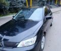 Чорний Міцубісі Lancer, об'ємом двигуна 1.6 л та пробігом 218 тис. км за 4300 $, фото 8 на Automoto.ua
