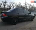 Чорний Міцубісі Lancer, об'ємом двигуна 1.58 л та пробігом 290 тис. км за 3200 $, фото 6 на Automoto.ua