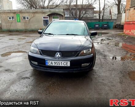 Чорний Міцубісі Lancer, об'ємом двигуна 2 л та пробігом 270 тис. км за 4900 $, фото 6 на Automoto.ua