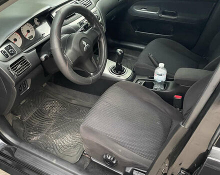 Чорний Міцубісі Lancer, об'ємом двигуна 1.6 л та пробігом 240 тис. км за 4599 $, фото 10 на Automoto.ua