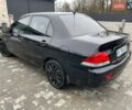 Чорний Міцубісі Lancer, об'ємом двигуна 1.58 л та пробігом 282 тис. км за 4100 $, фото 7 на Automoto.ua