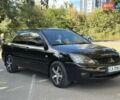 Черный Мицубиси Лансер, объемом двигателя 1.6 л и пробегом 203 тыс. км за 4600 $, фото 8 на Automoto.ua
