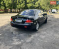 Чорний Міцубісі Lancer, об'ємом двигуна 1.58 л та пробігом 180 тис. км за 5200 $, фото 2 на Automoto.ua
