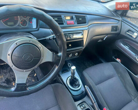 Чорний Міцубісі Lancer, об'ємом двигуна 2 л та пробігом 270 тис. км за 3300 $, фото 7 на Automoto.ua