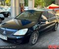 Чорний Міцубісі Lancer, об'ємом двигуна 1.6 л та пробігом 176 тис. км за 3777 $, фото 1 на Automoto.ua