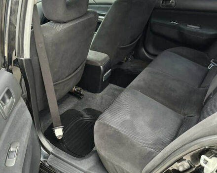 Чорний Міцубісі Lancer, об'ємом двигуна 1.58 л та пробігом 230 тис. км за 3350 $, фото 9 на Automoto.ua