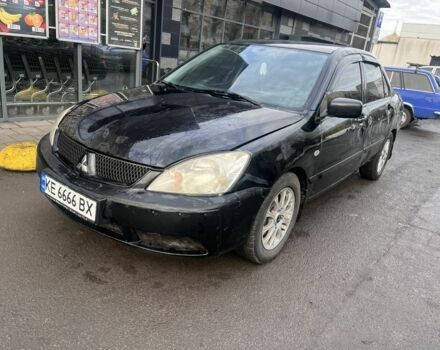 Черный Мицубиси Лансер, объемом двигателя 1.6 л и пробегом 299 тыс. км за 3480 $, фото 3 на Automoto.ua