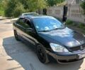 Чорний Міцубісі Lancer, об'ємом двигуна 1.6 л та пробігом 240 тис. км за 5400 $, фото 1 на Automoto.ua