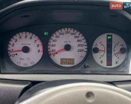 Чорний Міцубісі Lancer, об'ємом двигуна 2 л та пробігом 248 тис. км за 4990 $, фото 14 на Automoto.ua