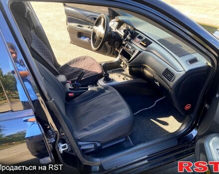 Чорний Міцубісі Lancer, об'ємом двигуна 1.6 л та пробігом 244 тис. км за 4100 $, фото 8 на Automoto.ua