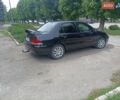 Черный Мицубиси Лансер, объемом двигателя 1.59 л и пробегом 243 тыс. км за 3650 $, фото 3 на Automoto.ua