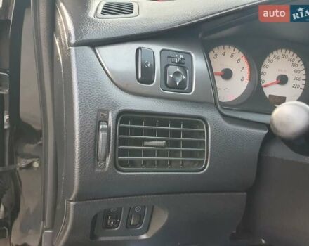 Черный Мицубиси Лансер, объемом двигателя 1.58 л и пробегом 222 тыс. км за 2999 $, фото 18 на Automoto.ua