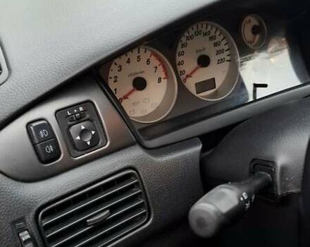 Черный Мицубиси Лансер, объемом двигателя 1.58 л и пробегом 246 тыс. км за 4200 $, фото 10 на Automoto.ua