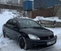Чорний Міцубісі Lancer, об'ємом двигуна 1.6 л та пробігом 200 тис. км за 3100 $, фото 1 на Automoto.ua