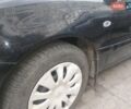 Черный Мицубиси Лансер, объемом двигателя 1.58 л и пробегом 139 тыс. км за 4600 $, фото 6 на Automoto.ua