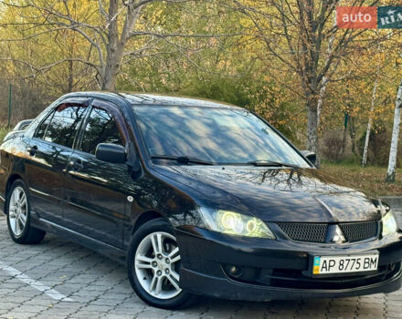 Міцубісі Lancer 2006 у Дніпро (Дніпропетровську) на Automoto.ua Чорний Міцубісі Lancer, об'ємом двигуна 2 л та пробігом 230 тис. км за 4900 $, фото 5 на Automoto.ua