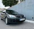Чорний Міцубісі Lancer, об'ємом двигуна 1.6 л та пробігом 298 тис. км за 3814 $, фото 1 на Automoto.ua