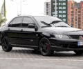Чорний Міцубісі Lancer, об'ємом двигуна 2 л та пробігом 253 тис. км за 6900 $, фото 1 на Automoto.ua