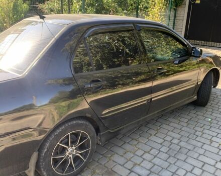 Чорний Міцубісі Lancer, об'ємом двигуна 1.6 л та пробігом 300 тис. км за 4200 $, фото 3 на Automoto.ua