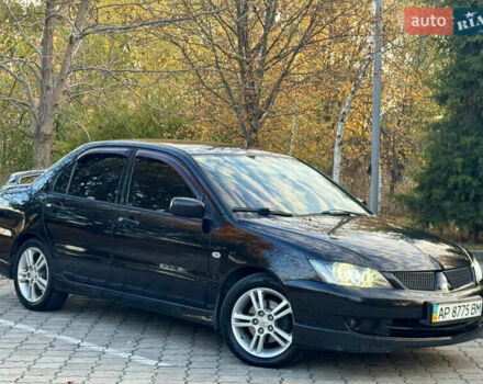 Міцубісі Lancer 2006 у Дніпро (Дніпропетровську) на Automoto.ua Чорний Міцубісі Lancer, об'ємом двигуна 2 л та пробігом 230 тис. км за 4900 $, фото 6 на Automoto.ua