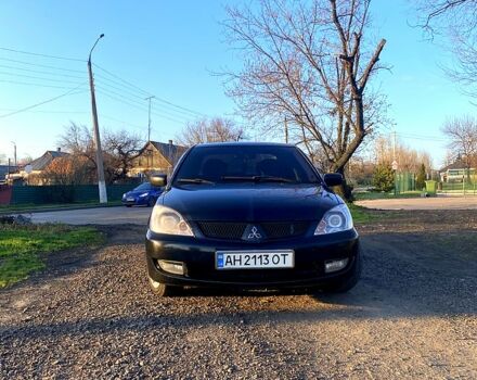 Чорний Міцубісі Lancer, об'ємом двигуна 1.6 л та пробігом 330 тис. км за 4500 $, фото 11 на Automoto.ua