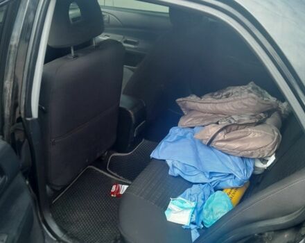 Черный Мицубиси Лансер, объемом двигателя 1.6 л и пробегом 260 тыс. км за 3800 $, фото 4 на Automoto.ua