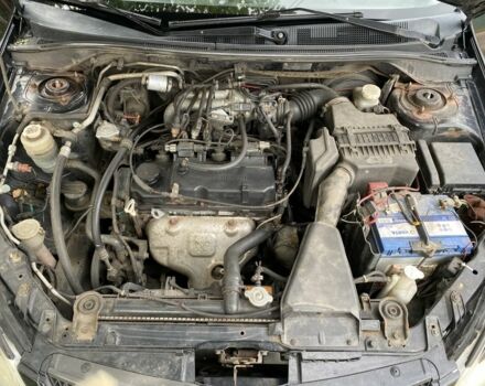 Черный Мицубиси Лансер, объемом двигателя 1.6 л и пробегом 386 тыс. км за 3950 $, фото 5 на Automoto.ua