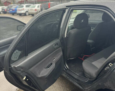 Черный Мицубиси Лансер, объемом двигателя 1.6 л и пробегом 368 тыс. км за 3200 $, фото 8 на Automoto.ua