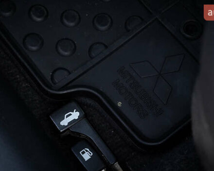 Черный Мицубиси Лансер, объемом двигателя 2 л и пробегом 253 тыс. км за 6900 $, фото 13 на Automoto.ua