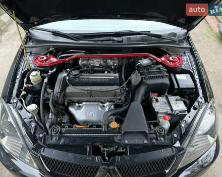 Чорний Міцубісі Lancer, об'ємом двигуна 2 л та пробігом 242 тис. км за 5900 $, фото 8 на Automoto.ua
