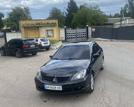 Чорний Міцубісі Lancer, об'ємом двигуна 2 л та пробігом 183 тис. км за 4500 $, фото 17 на Automoto.ua