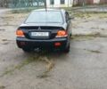 Чорний Міцубісі Lancer, об'ємом двигуна 1.6 л та пробігом 230 тис. км за 3250 $, фото 2 на Automoto.ua