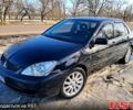 Чорний Міцубісі Lancer, об'ємом двигуна 1.6 л та пробігом 23700 тис. км за 3999 $, фото 1 на Automoto.ua