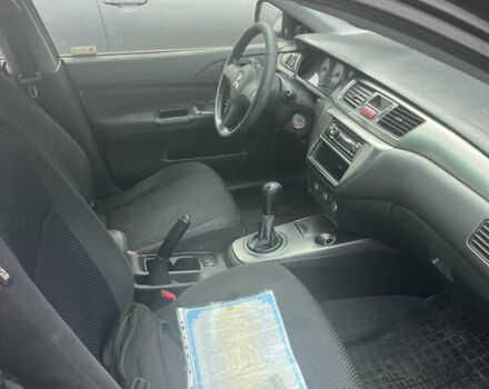 Черный Мицубиси Лансер, объемом двигателя 1.58 л и пробегом 250 тыс. км за 2450 $, фото 4 на Automoto.ua