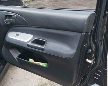 Чорний Міцубісі Lancer, об'ємом двигуна 1.59 л та пробігом 185 тис. км за 4900 $, фото 4 на Automoto.ua