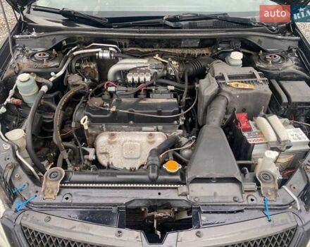 Чорний Міцубісі Lancer, об'ємом двигуна 1.6 л та пробігом 335 тис. км за 3500 $, фото 9 на Automoto.ua