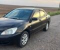 Чорний Міцубісі Lancer, об'ємом двигуна 1.6 л та пробігом 292 тис. км за 4000 $, фото 1 на Automoto.ua