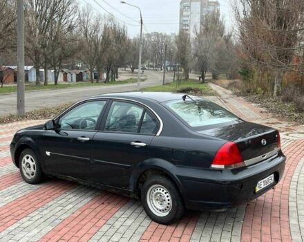 Черный Мицубиси Лансер, объемом двигателя 1.6 л и пробегом 250 тыс. км за 1300 $, фото 5 на Automoto.ua