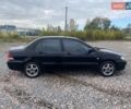 Чорний Міцубісі Lancer, об'ємом двигуна 1.6 л та пробігом 335 тис. км за 3500 $, фото 4 на Automoto.ua