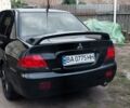 Чорний Міцубісі Lancer, об'ємом двигуна 1.59 л та пробігом 185 тис. км за 4900 $, фото 10 на Automoto.ua