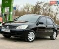 Черный Мицубиси Лансер, объемом двигателя 1.58 л и пробегом 265 тыс. км за 4800 $, фото 1 на Automoto.ua