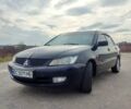 Чорний Міцубісі Lancer, об'ємом двигуна 1.6 л та пробігом 360 тис. км за 3199 $, фото 1 на Automoto.ua