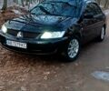 Чорний Міцубісі Lancer, об'ємом двигуна 1.6 л та пробігом 345 тис. км за 3700 $, фото 1 на Automoto.ua