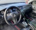 Черный Мицубиси Лансер, объемом двигателя 1.6 л и пробегом 200 тыс. км за 3400 $, фото 4 на Automoto.ua
