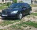 Чорний Міцубісі Lancer, об'ємом двигуна 1.58 л та пробігом 277 тис. км за 3900 $, фото 1 на Automoto.ua