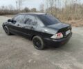 Чорний Міцубісі Lancer, об'ємом двигуна 0.16 л та пробігом 280 тис. км за 4000 $, фото 6 на Automoto.ua