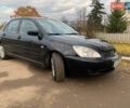 Черный Мицубиси Лансер, объемом двигателя 1.58 л и пробегом 195 тыс. км за 4800 $, фото 16 на Automoto.ua